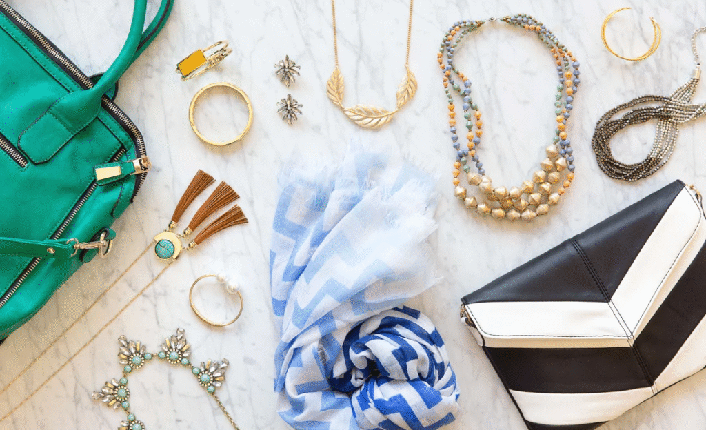 Stylish accessories including rings, earrings, scarves, and handbags for modern fashion.